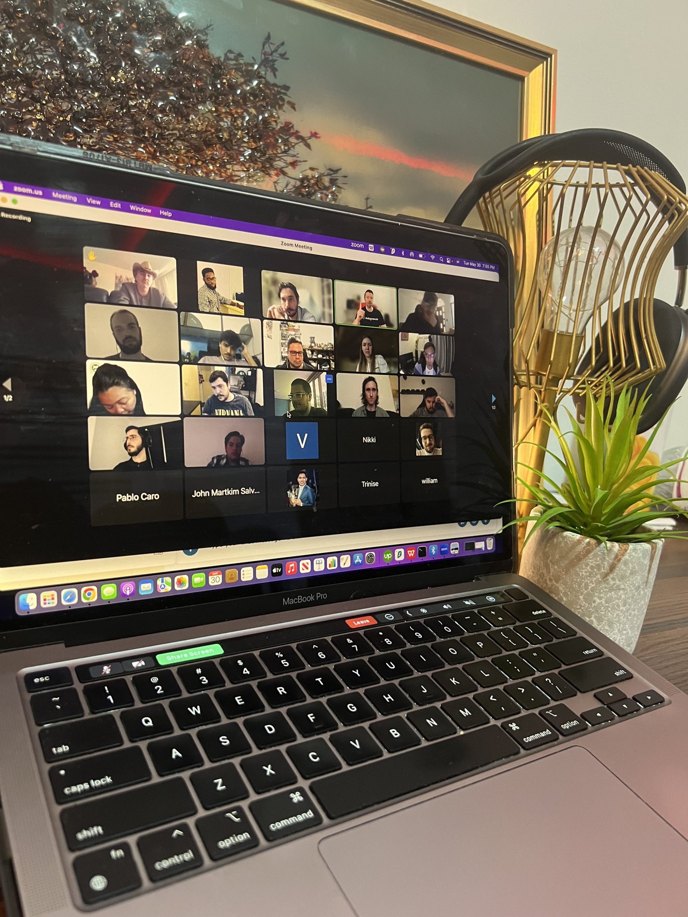 An AutoGrow all-hands team call on Zoom, shown on a laptop